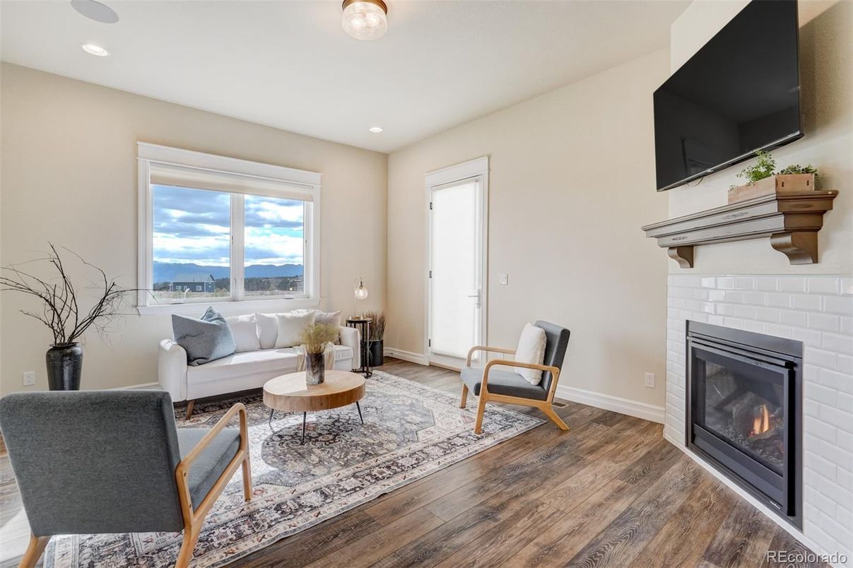 Fireplace, Interior, Living room, Recessed Lighting, Water, Wood Texture Flooring