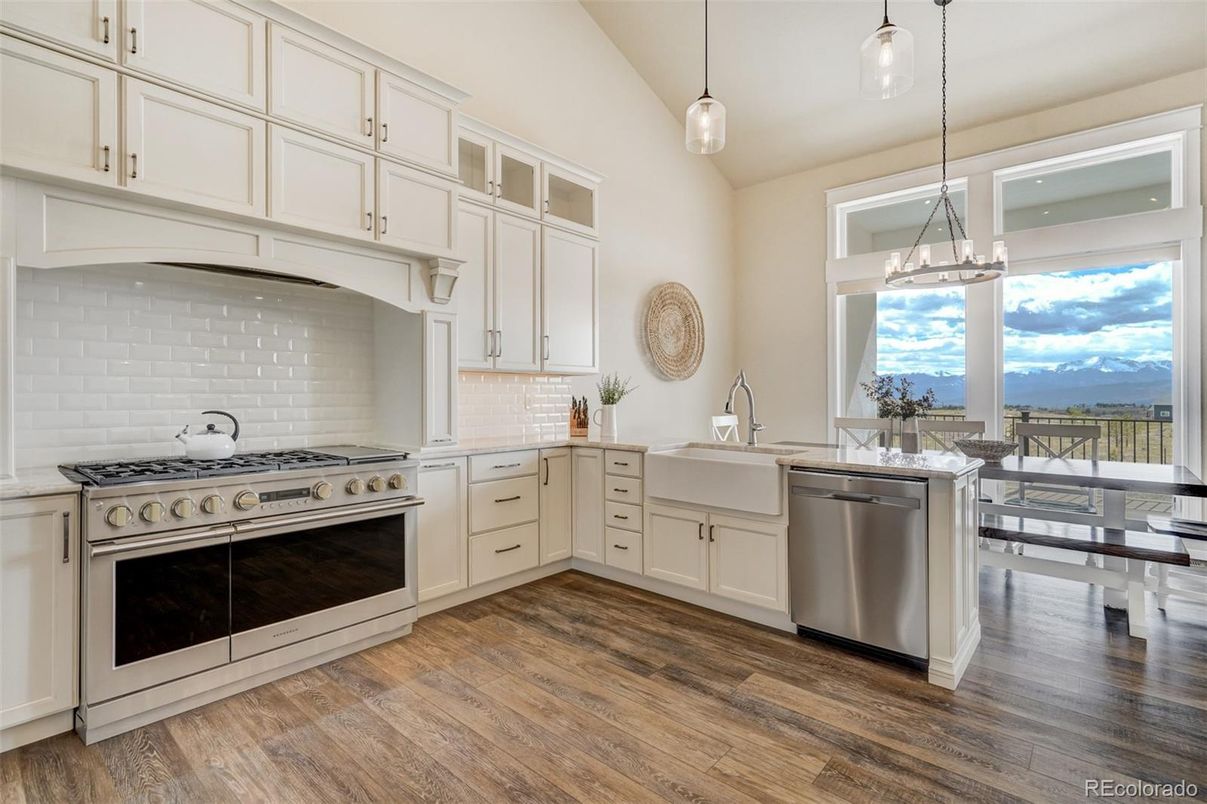 Dining room, Interior, Kitchen, Pendant Lights, Stainless Steel Appliances, Water, Wood Texture Flooring