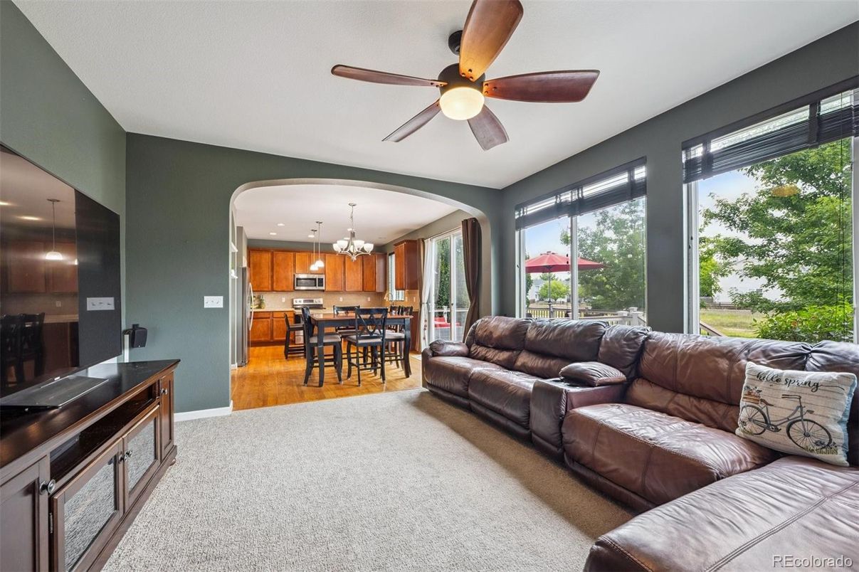 Chandelier, Dining room, Interior, Kitchen, Living room, Stainless Steel Appliances, Wood Texture Flooring