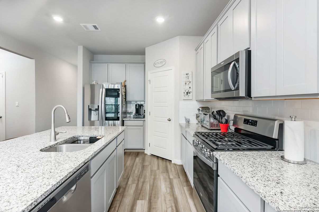 Interior, Kitchen, Recessed Lighting, Stainless Steel Appliances, Wood Texture Flooring
