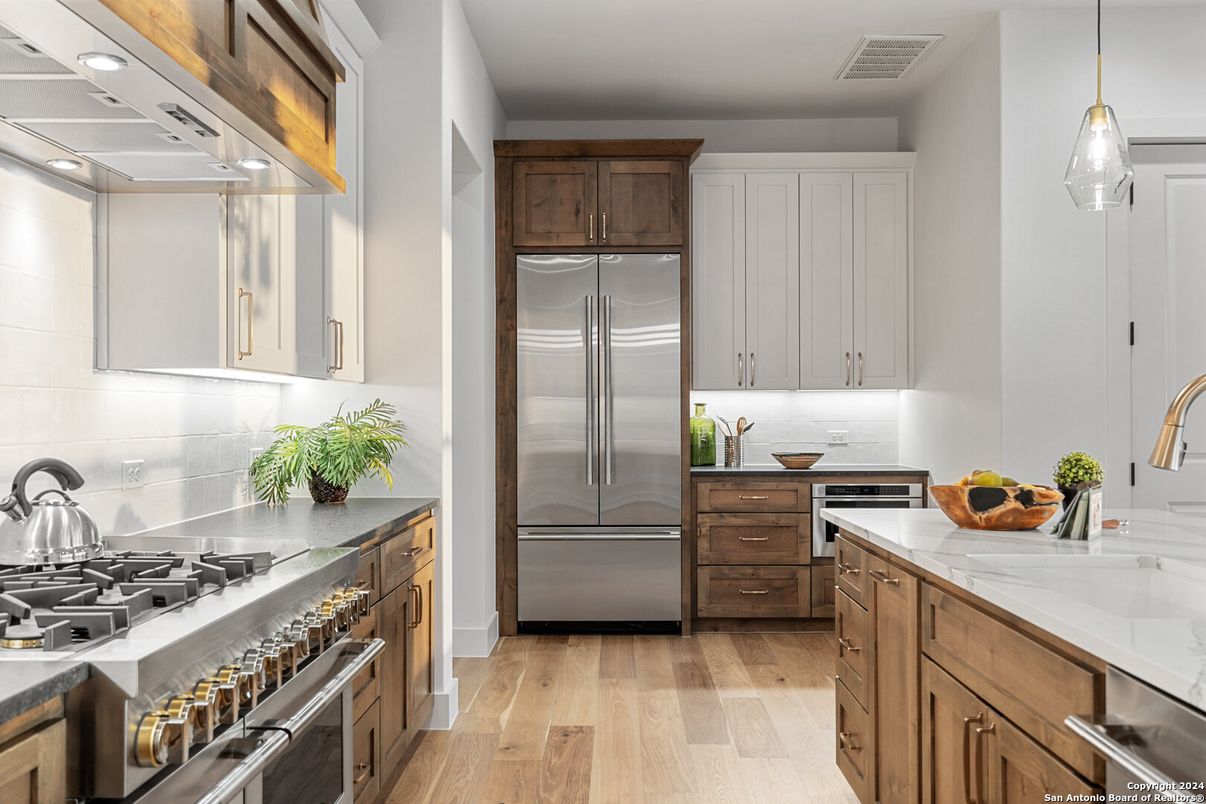 Interior, Kitchen, Pendant Lights, Recessed Lighting, Stainless Steel Appliances, Wood Texture Flooring
