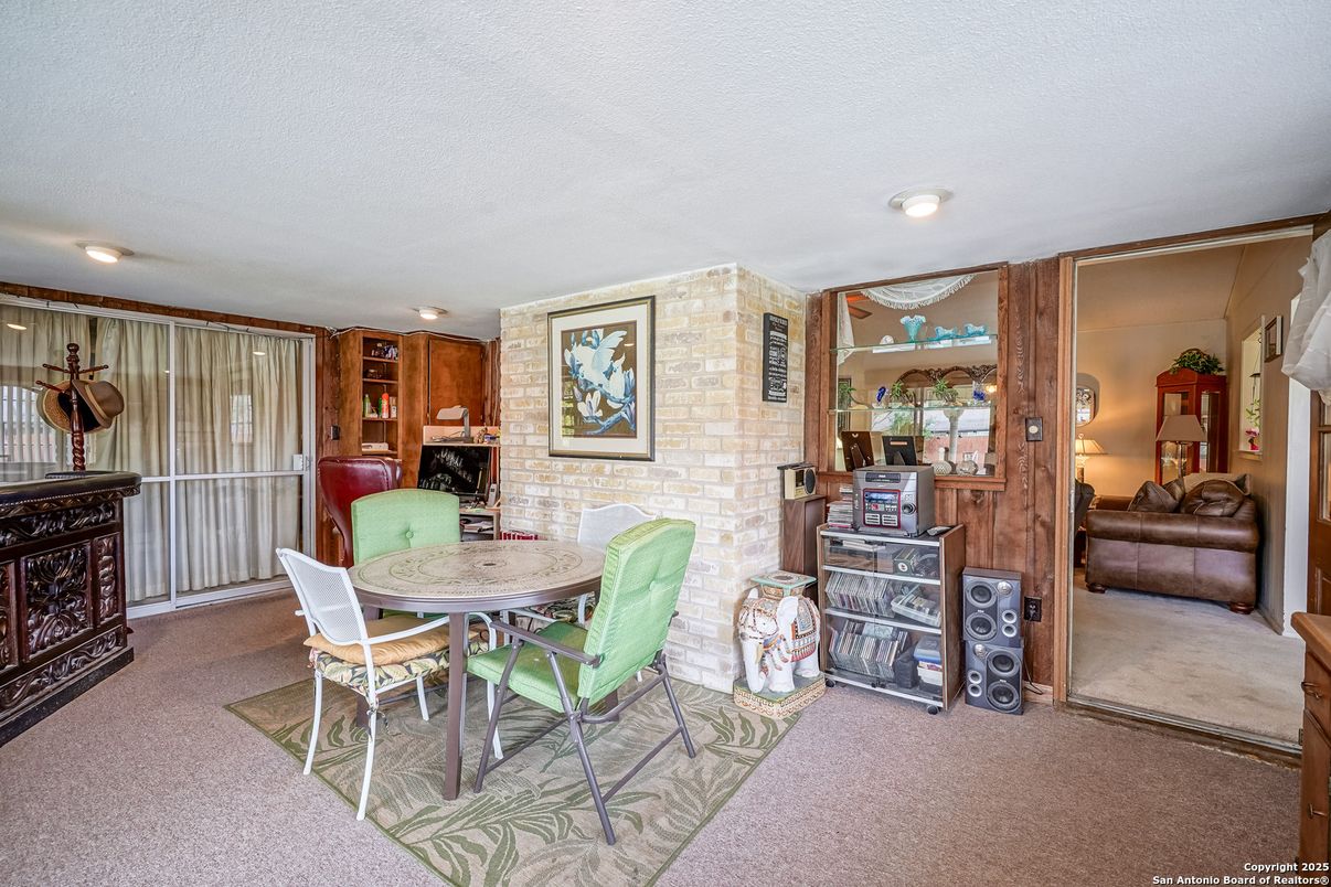 Dining room, Fireplace, Interior, Recessed Lighting, Stone Walls