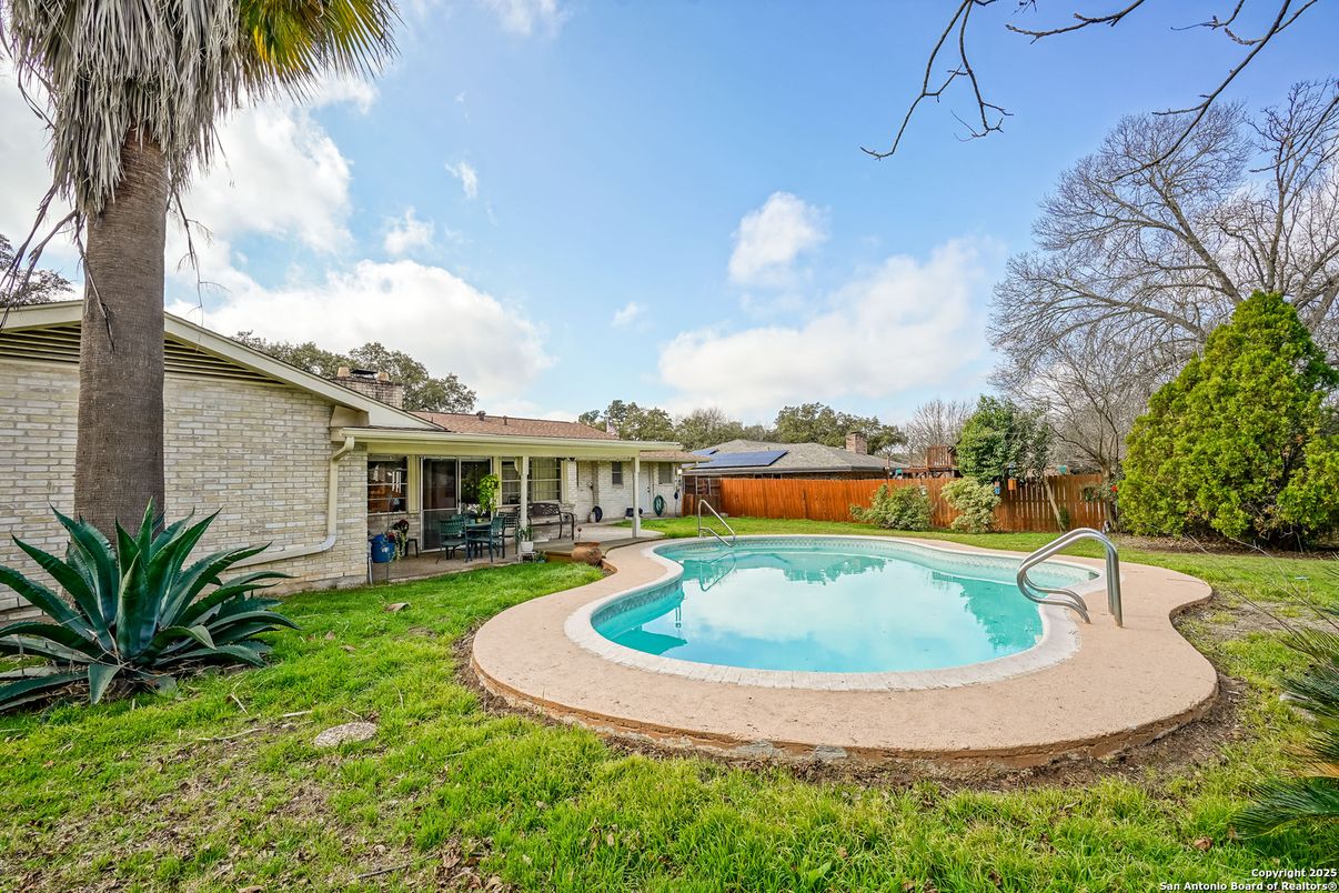 Exterior, Pool, Solar Panels