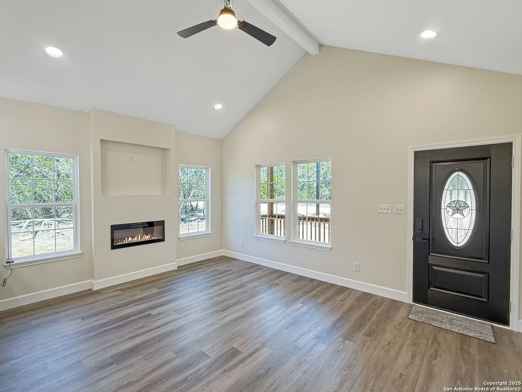 Empty room, Fireplace, Interior, Recessed Lighting, Wood Texture Flooring