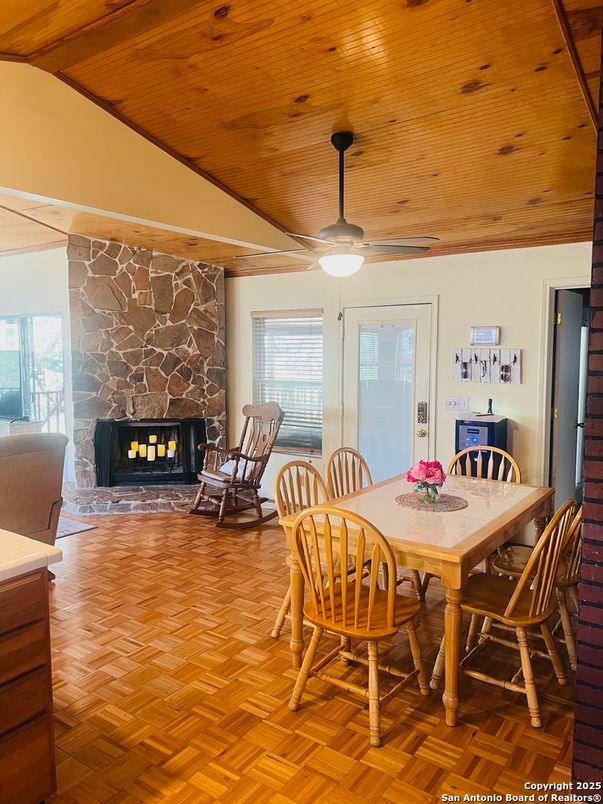 Dining room, Fireplace, Interior, Stone Walls, Wooden Ceilings, Wood Texture Flooring