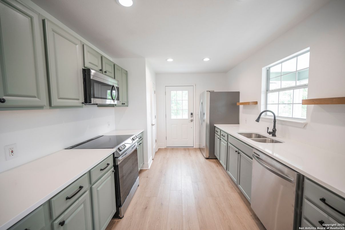 Interior, Kitchen, Recessed Lighting, Stainless Steel Appliances, Wood Texture Flooring