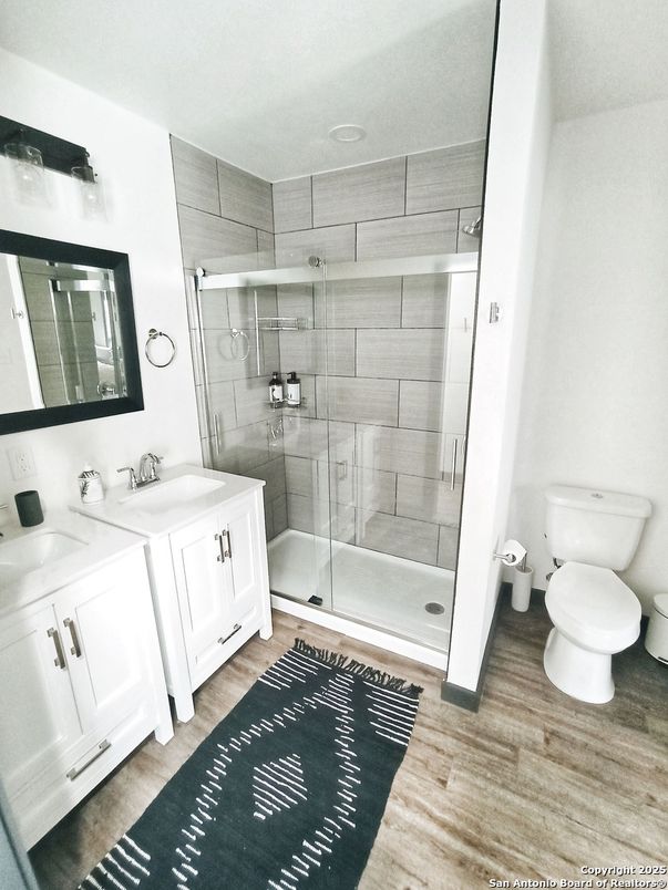 Bathroom, Dual Sink Vanities, Glass Shower, Interior, Wood Texture Flooring