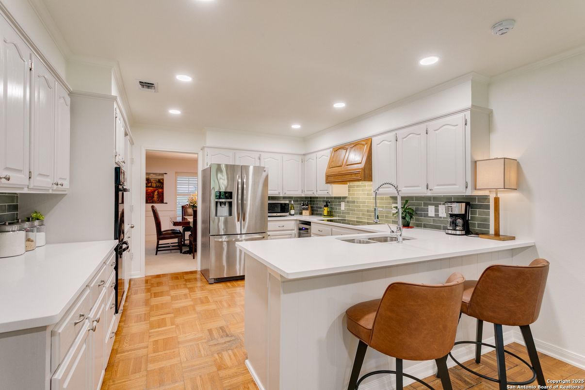 Dining room, Interior, Kitchen, Recessed Lighting, Stainless Steel Appliances, Wood Texture Flooring