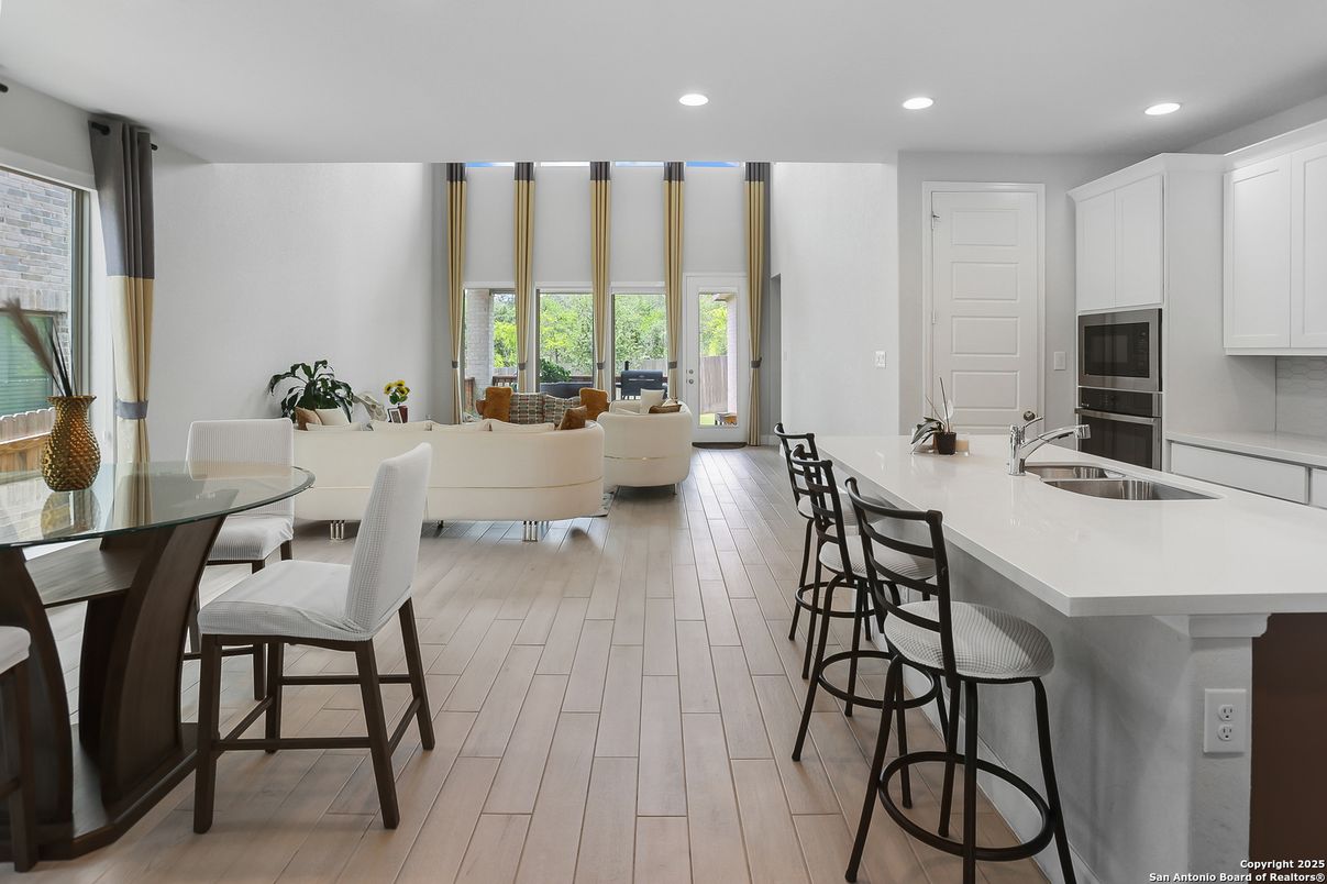 Dining room, Interior, Kitchen, Living room, Recessed Lighting, Wood Texture Flooring