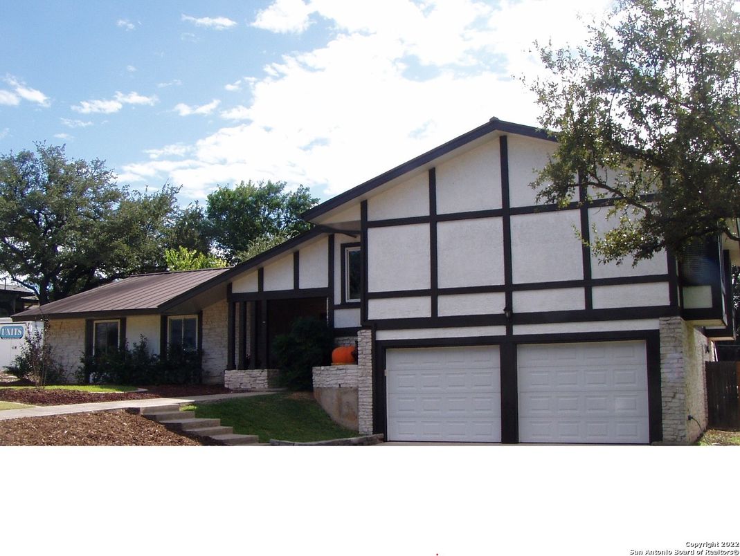Attached, Exterior, Facade, Brick Facade, Tudor Revival