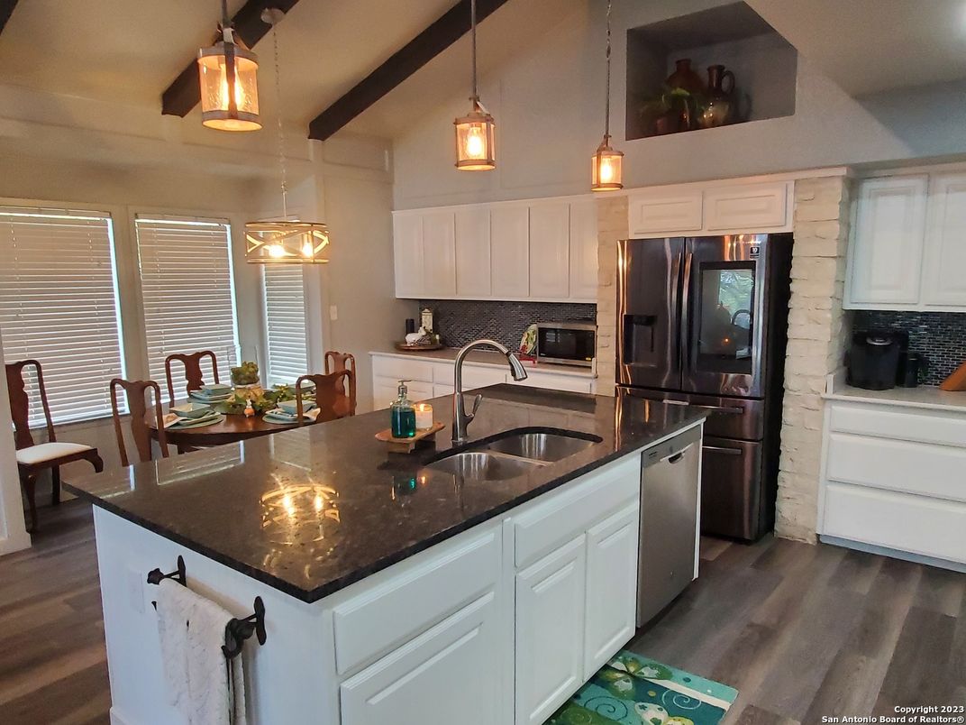 Dining room, Interior, Kitchen, Pendant Lights, Stainless Steel Appliances, Wood Texture Flooring