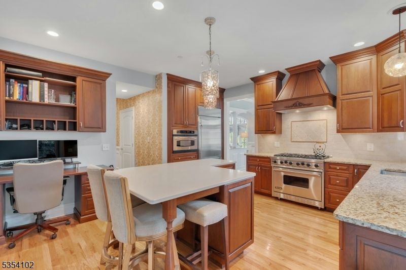 Chandelier, Interior, Kitchen, Pendant Lights, Recessed Lighting, Stainless Steel Appliances, Wood Texture Flooring