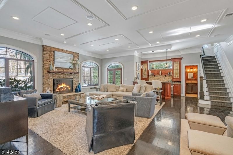 Fireplace, Interior, Living room, Pendant Lights, Recessed Lighting, Stone Walls, Wood Texture Flooring