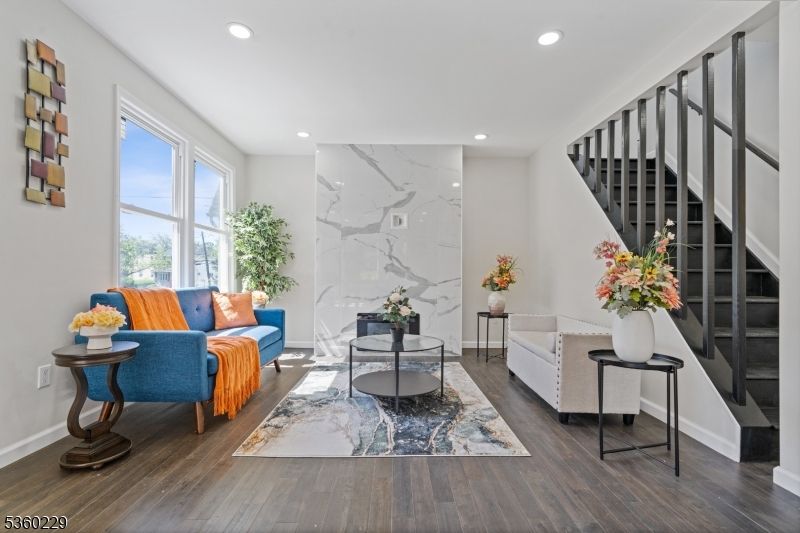 Interior, Living room, Marble Walls, Recessed Lighting, Wood Texture Flooring