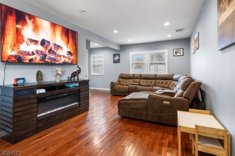 Fireplace, Interior, Living room, Recessed Lighting, Wood Texture Flooring