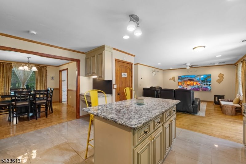 Chandelier, Dining room, Interior, Kitchen, Living room, Recessed Lighting, Wood Texture Flooring
