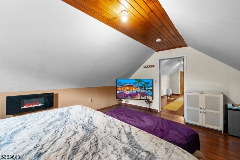 Bedroom, Fireplace, Interior, Recessed Lighting, Wooden Ceilings, Wood Texture Flooring
