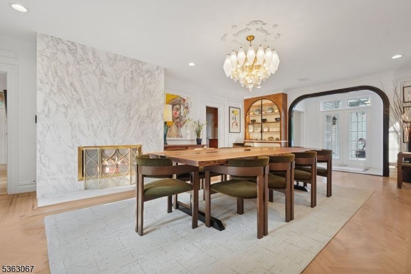 Chandelier, Dining room, Interior, Marble Walls, Recessed Lighting, Wood Texture Flooring