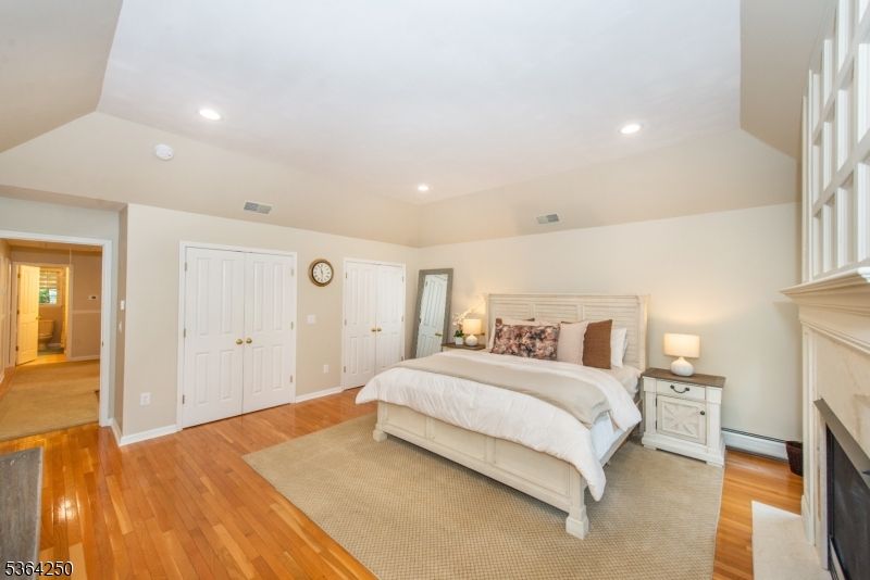 Bedroom, Fireplace, Interior, Recessed Lighting, Wood Texture Flooring