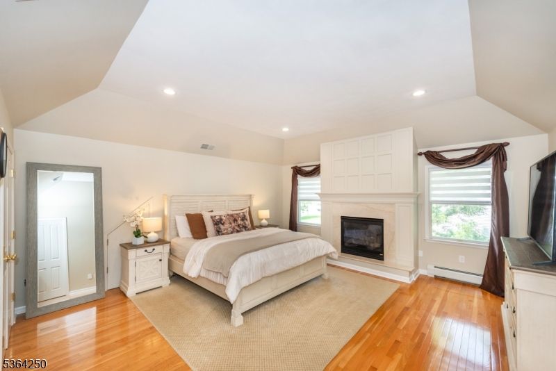 Bedroom, Fireplace, Interior, Recessed Lighting, Wood Texture Flooring
