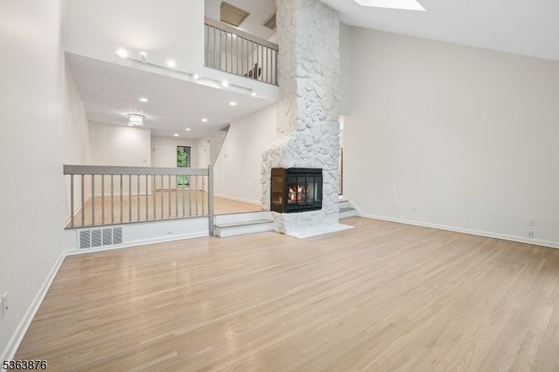 Fireplace, Interior, Recessed Lighting, Wood Texture Flooring