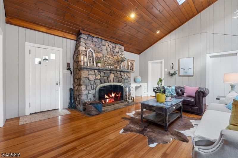 Fireplace, Interior, Living room, Recessed Lighting, Stone Walls, Wooden Ceilings, Wood Texture Flooring