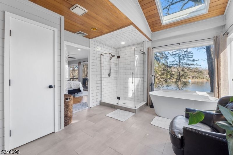 Bathroom, Free Standing Baths, Glass Ceilings, Glass Shower, Interior, Recessed Lighting, Water, Wooden Ceilings