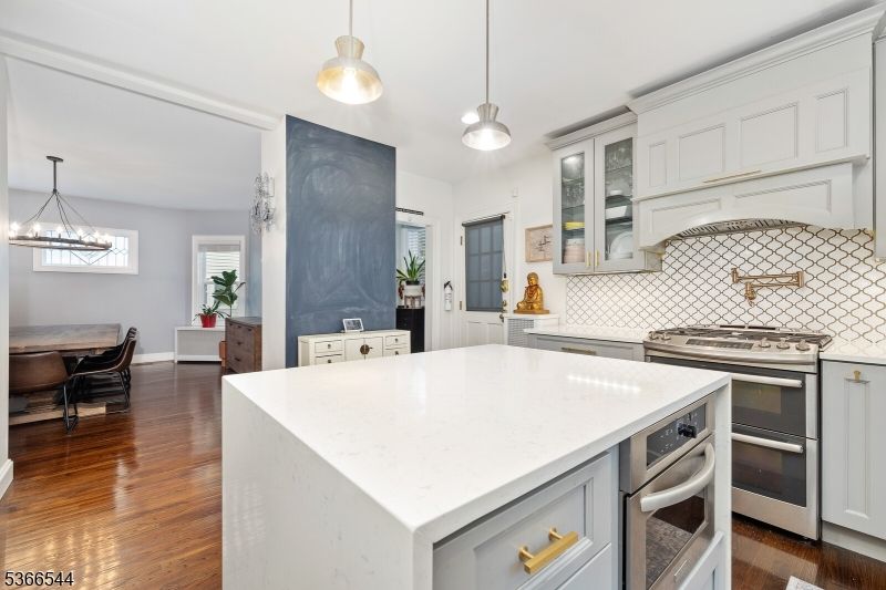 Dining room, Interior, Kitchen, Pendant Lights, Stainless Steel Appliances, Wood Texture Flooring