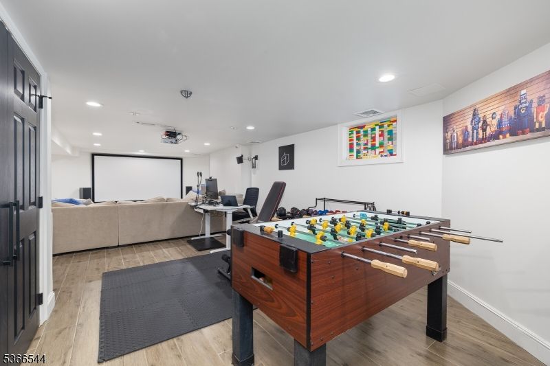 Game Room, Interior, Living room, Projection Screen, Recessed Lighting, Wood Texture Flooring