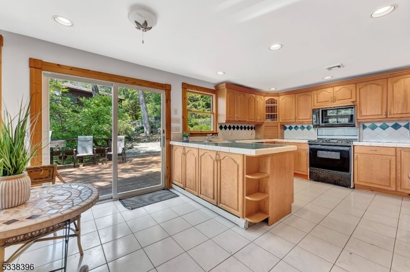 Interior, Kitchen, Recessed Lighting, Tile Countertops