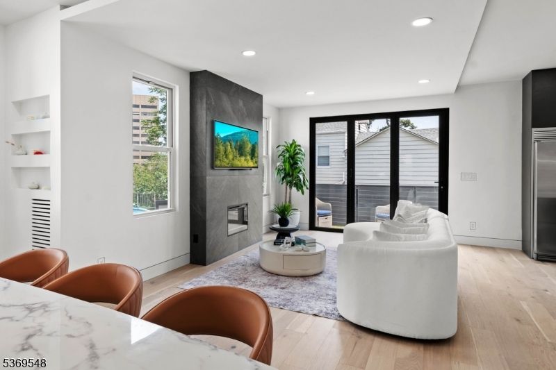 Fireplace, Interior, Living room, Recessed Lighting, Wood Texture Flooring