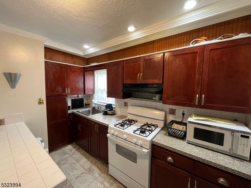 Interior, Kitchen, Recessed Lighting, Tile Countertops