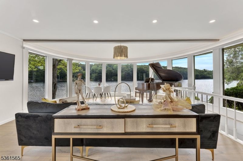 Dining room, Interior, Living room, Pendant Lights, Piano, Recessed Lighting, Water, Wood Texture Flooring