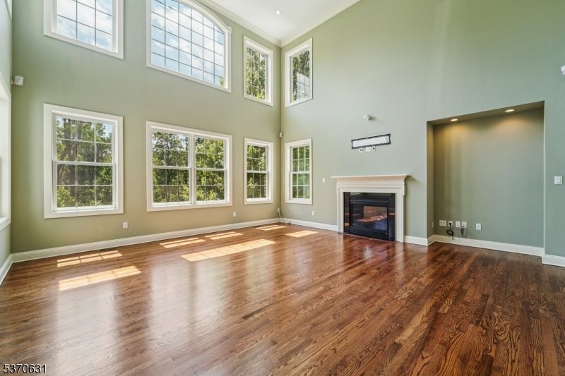 Empty room, Fireplace, Interior, Recessed Lighting, Wood Texture Flooring