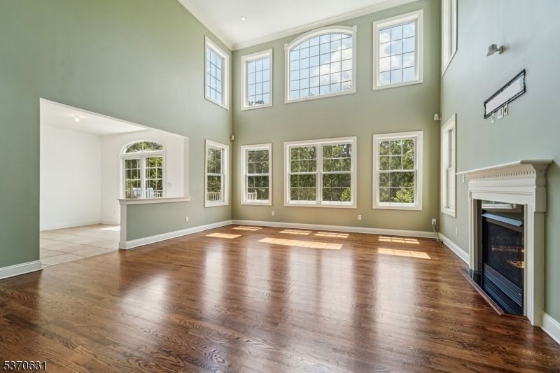 Empty room, Fireplace, Interior, Recessed Lighting, Wood Texture Flooring