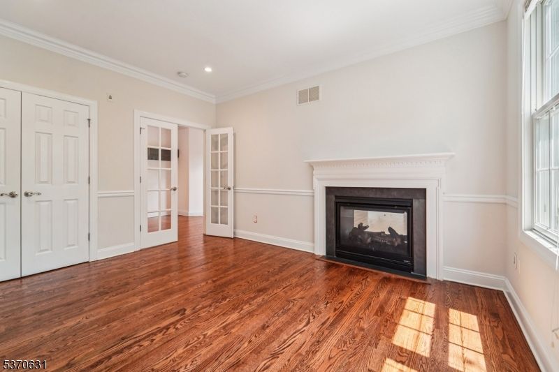 Empty room, Fireplace, Interior, Recessed Lighting, Wood Texture Flooring