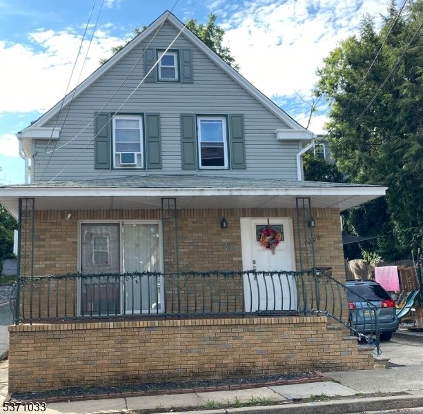 Exterior, Facade, Brick Facade, Queen Anne Victorian
