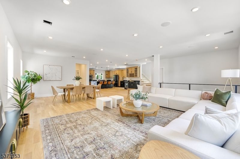 Dining room, Interior, Kitchen, Living room, Pendant Lights, Recessed Lighting, Stainless Steel Appliances, Wood Texture Flooring