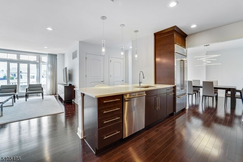 Dining room, Interior, Kitchen, Living room, Pendant Lights, Recessed Lighting, Stainless Steel Appliances, Wood Texture Flooring