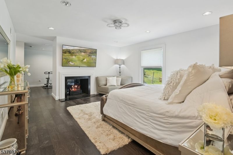 Bedroom, Fireplace, Interior, Recessed Lighting, Wood Texture Flooring