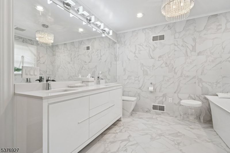 Bathroom, Chandelier, Dual Sink Vanities, Interior, Marble, Marble Walls, Recessed Lighting
