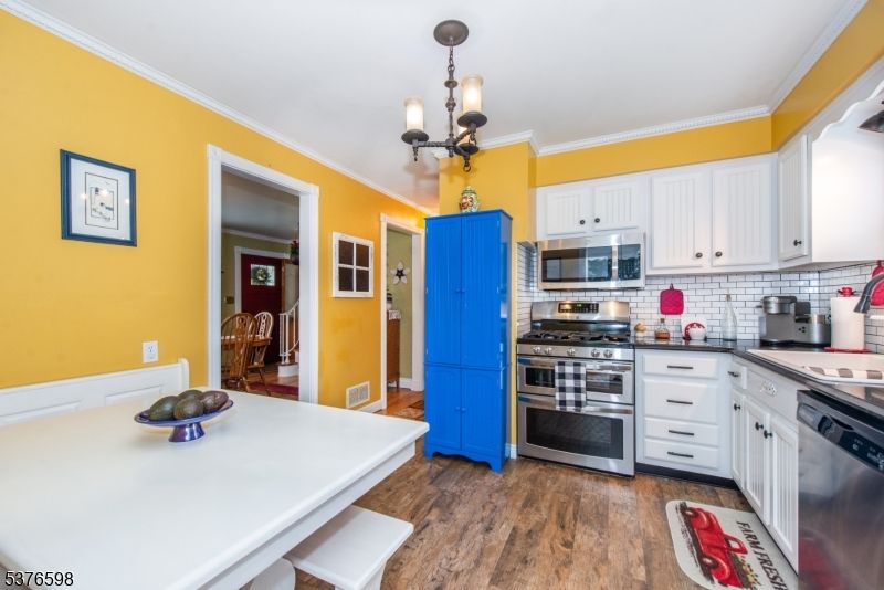 Chandelier, Interior, Kitchen, Pendant Lights, Stainless Steel Appliances, Wood Texture Flooring