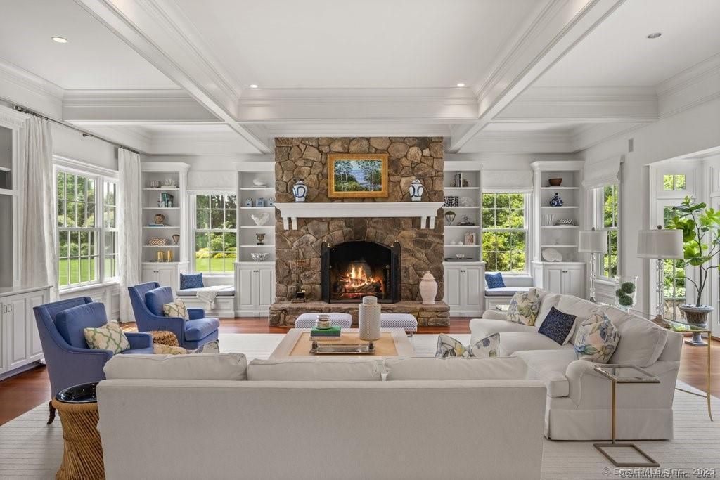 Fireplace, Interior, Living room, Recessed Lighting, Stone Walls, Wood Texture Flooring