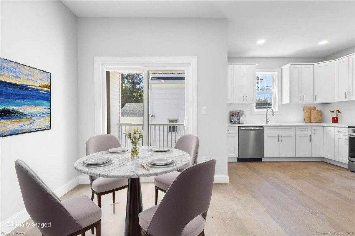 Dining room, Interior, Kitchen, Recessed Lighting, Stainless Steel Appliances, Wood Texture Flooring