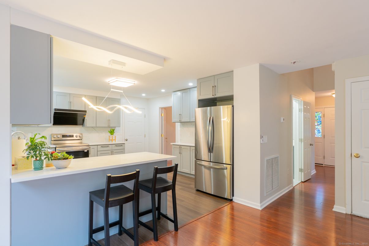 Interior, Kitchen, Pendant Lights, Recessed Lighting, Stainless Steel Appliances, Wood Texture Flooring