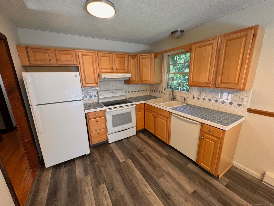 Interior, Kitchen, Tile Countertops, Wood Texture Flooring