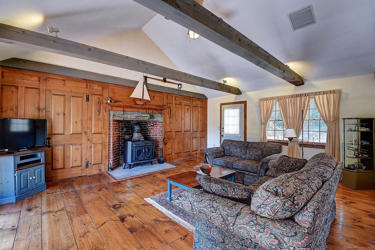 Fireplace, Interior, Living room, Stone Walls, Wooden Beams, Wood Texture Flooring