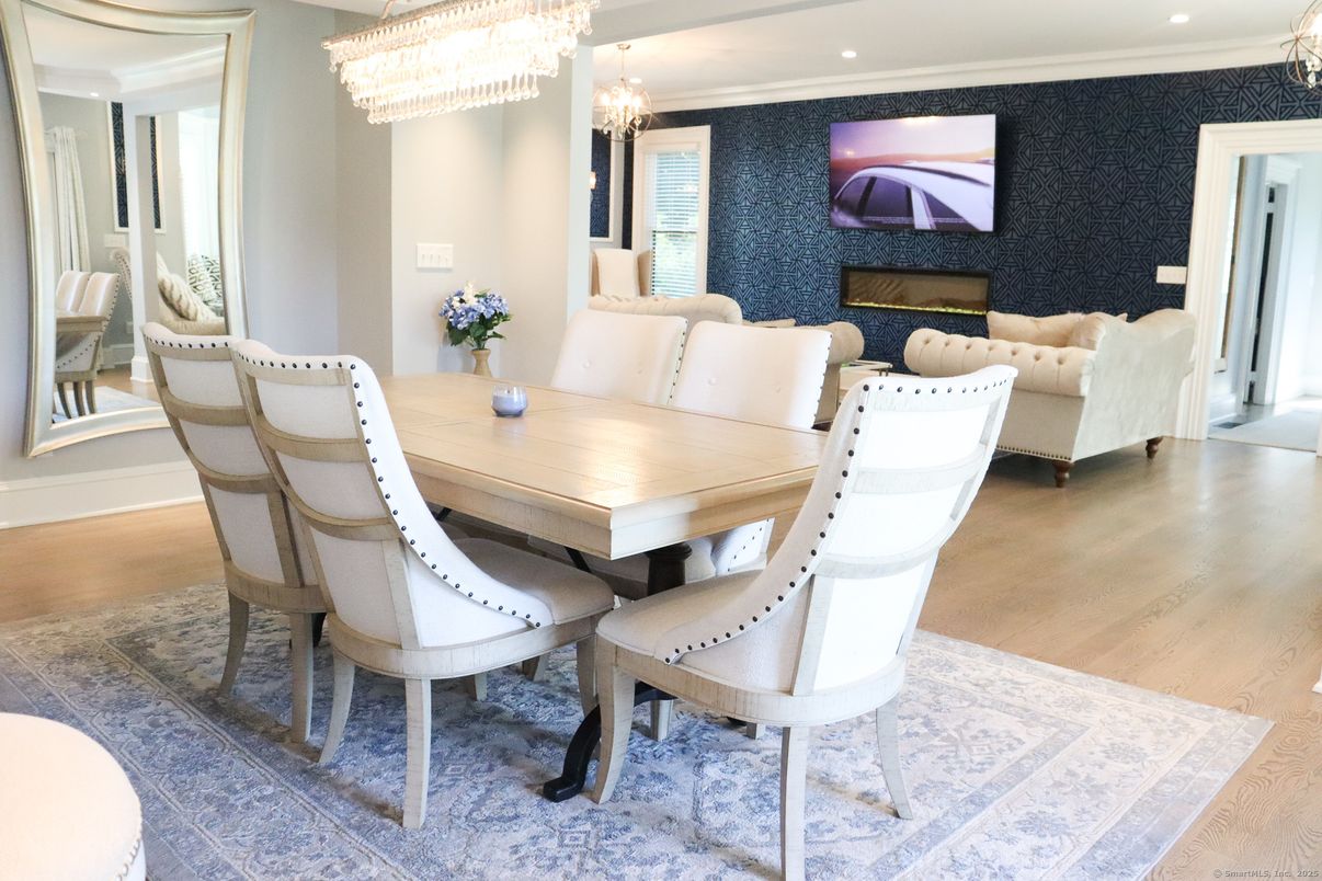 Chandelier, Dining room, Fireplace, Interior, Recessed Lighting, Wood Texture Flooring