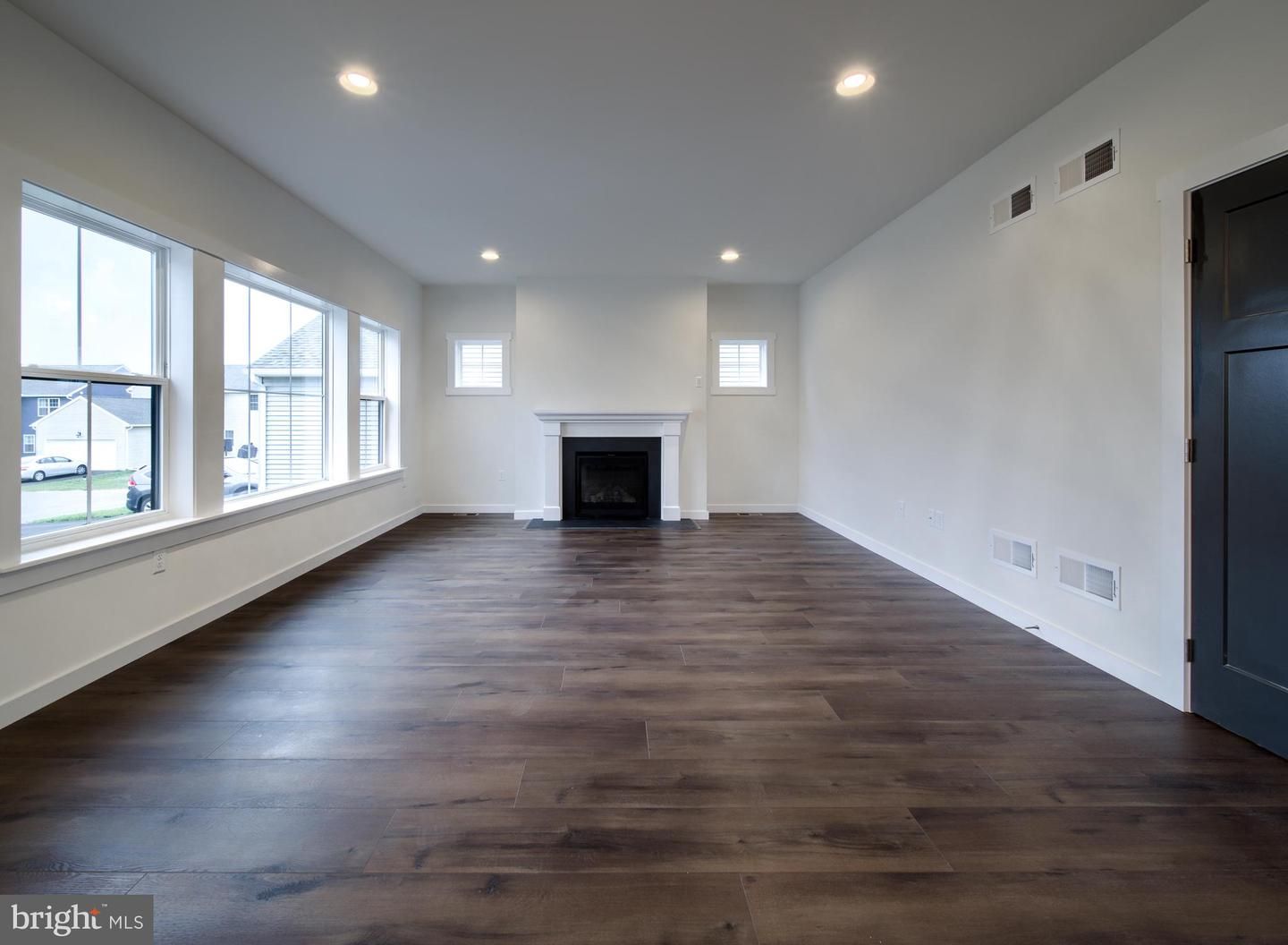 Empty room, Fireplace, Interior, Recessed Lighting, Wood Texture Flooring