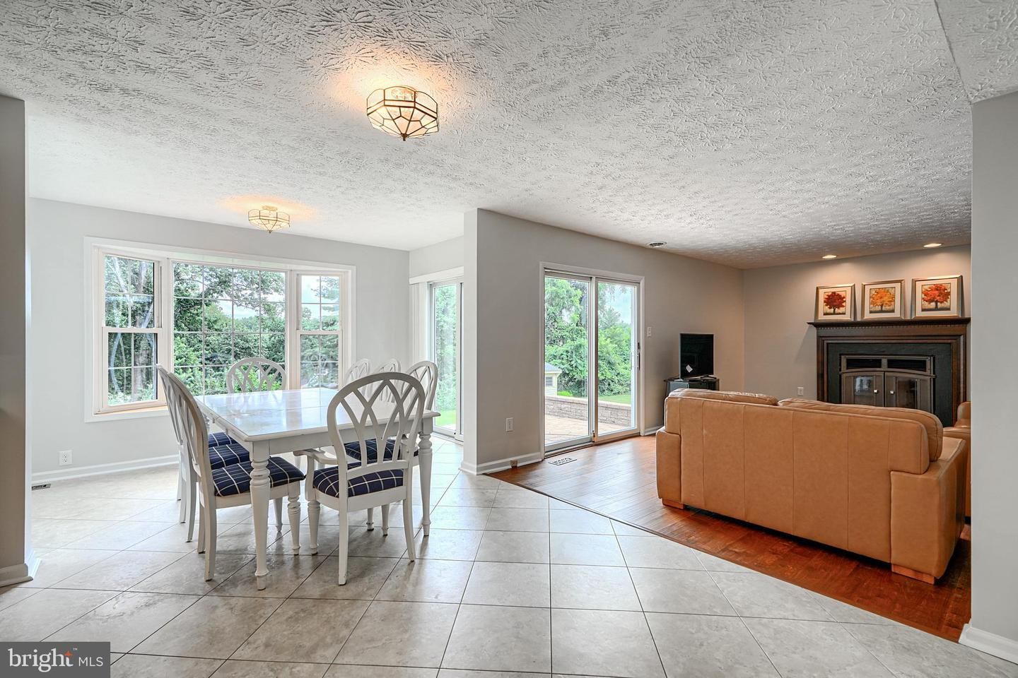Dining room, Fireplace, Interior, Living room, Recessed Lighting, Wood Texture Flooring